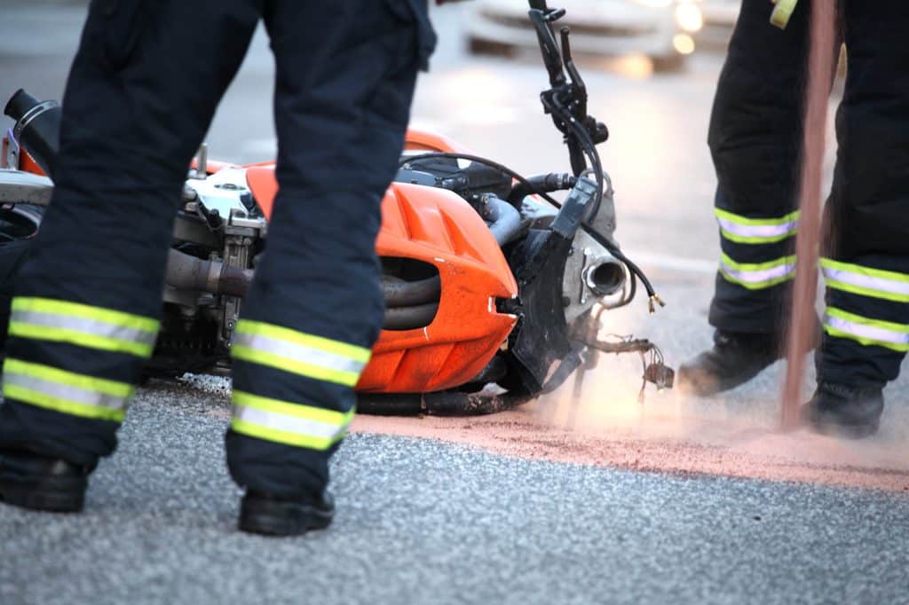 First responders marking the scene of a motorcycle accident