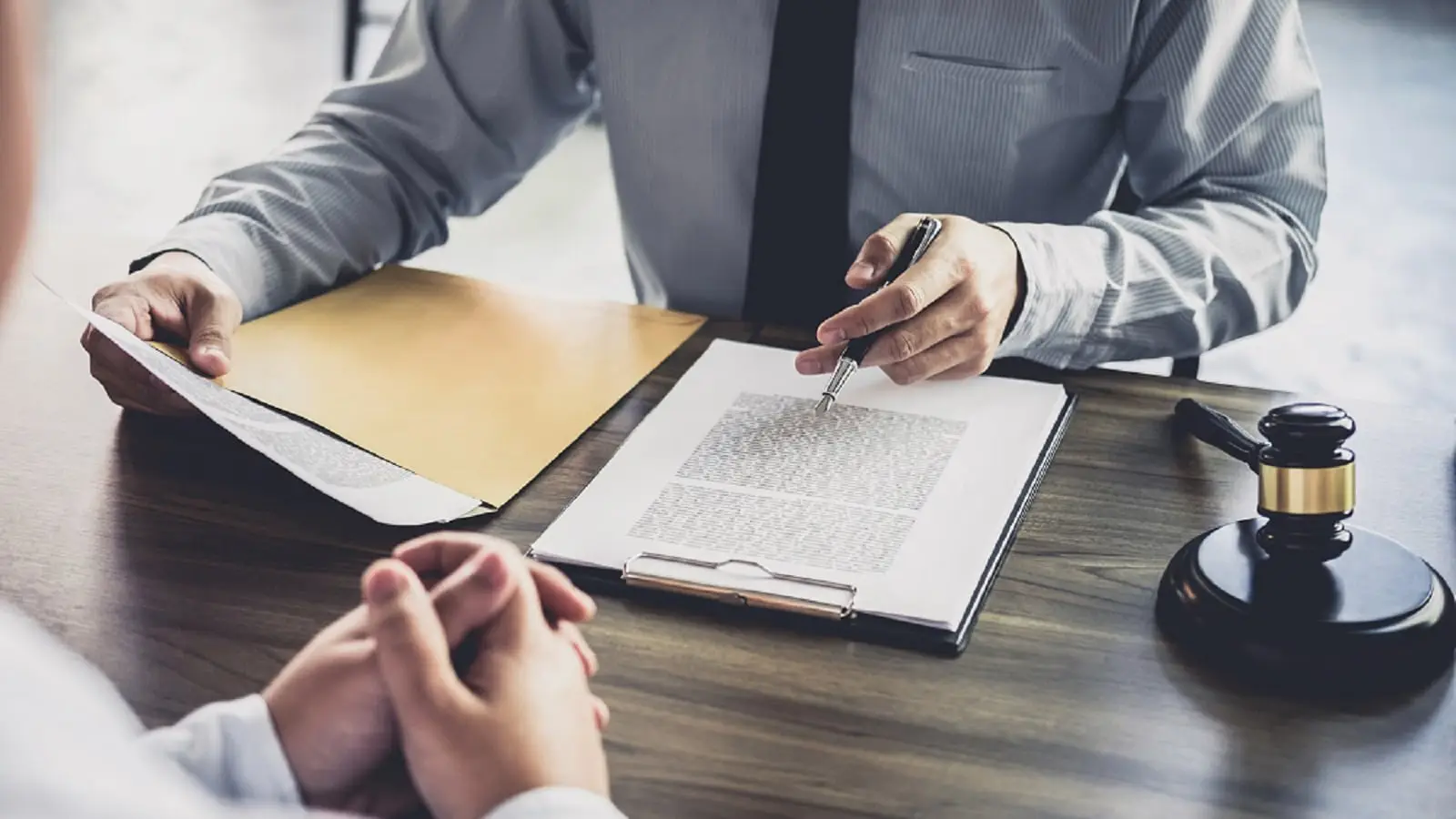 Attorney Signing Legal Document Stock Photo
