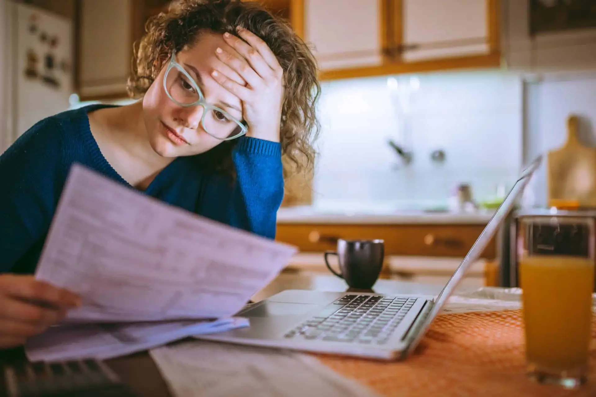 woman reading through documents