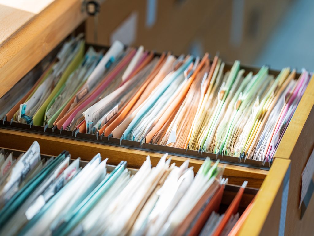 Financial documents stored in filing cabinets.