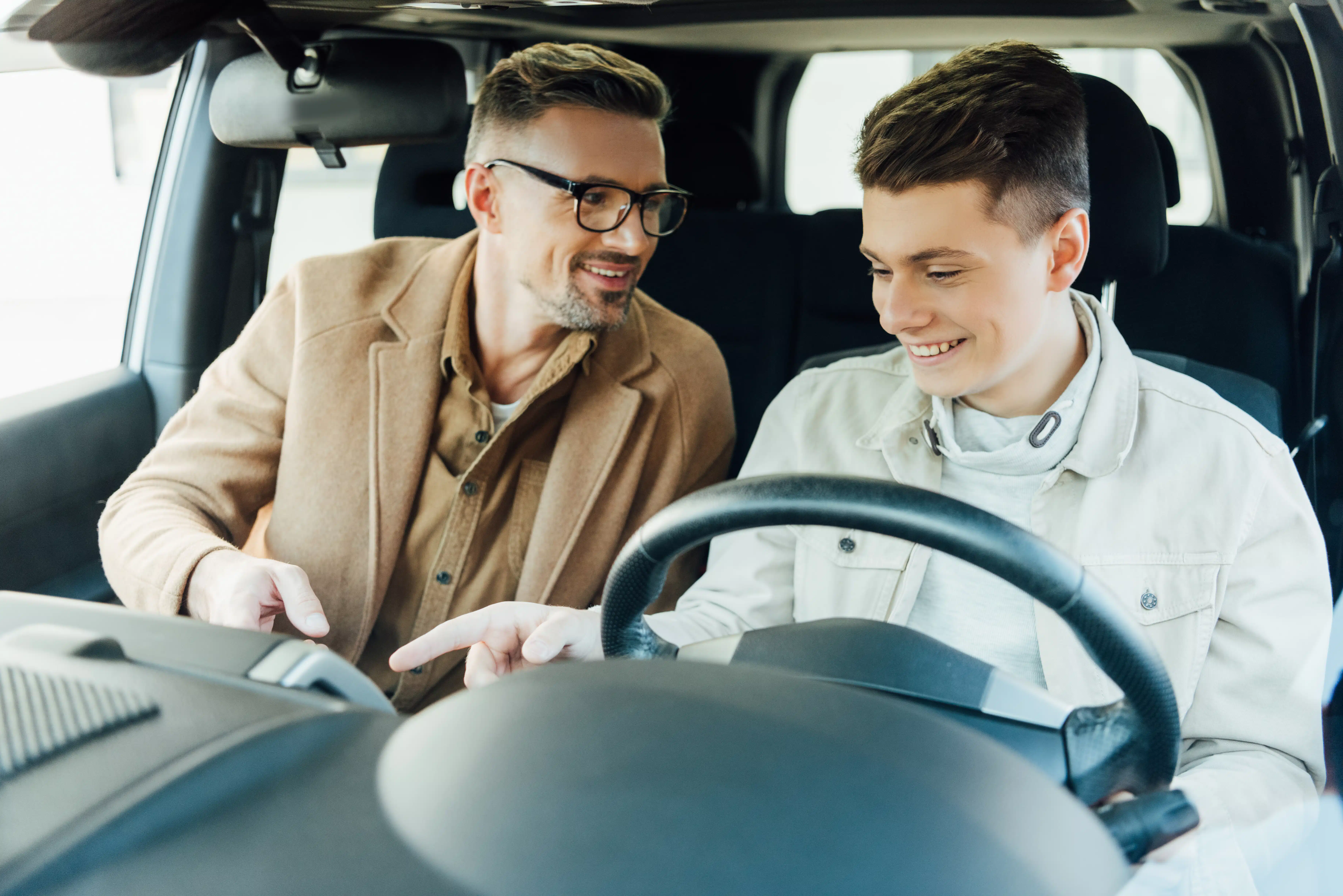 dad-teaching-son-how-to-drive