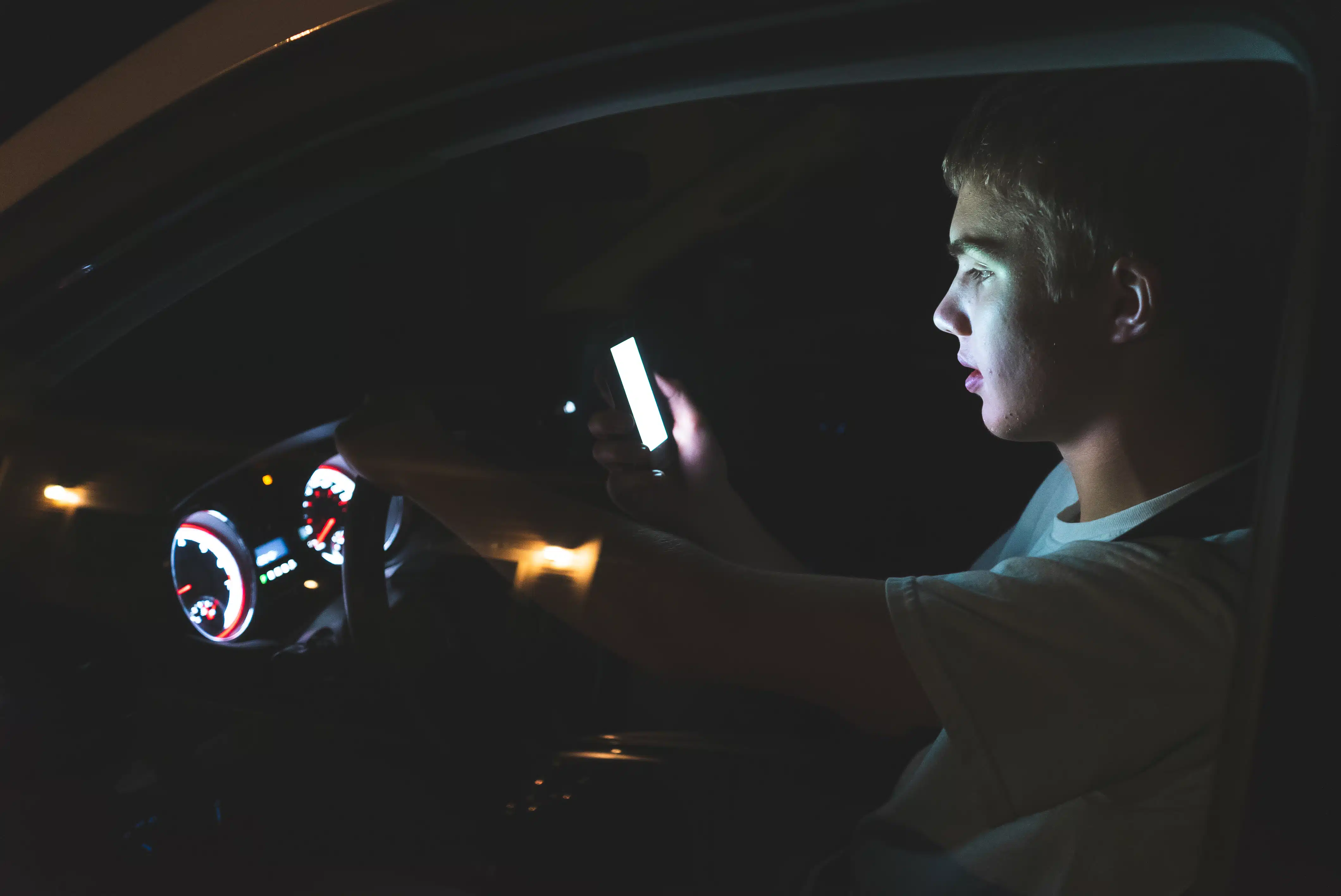distracted-teenage-driver-on-cell-phone