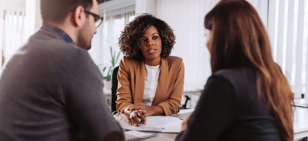 A couple consulting with a personal injury attorney