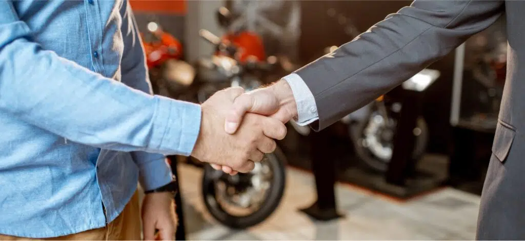 A close-up of two people shaking hands