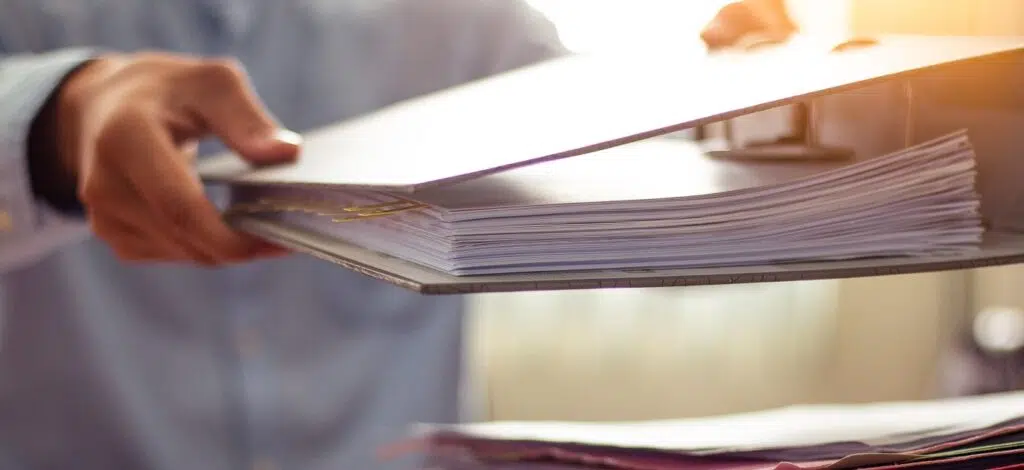 closeup of a stack of paperwork for a social security disability hearing