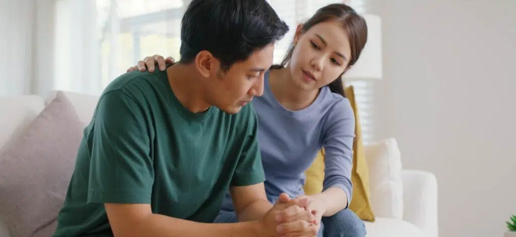 a couple discussing a serious issue after a tbi