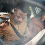 Couple Involved In Car Crash With Male Driver Suffering With Whiplash Injury